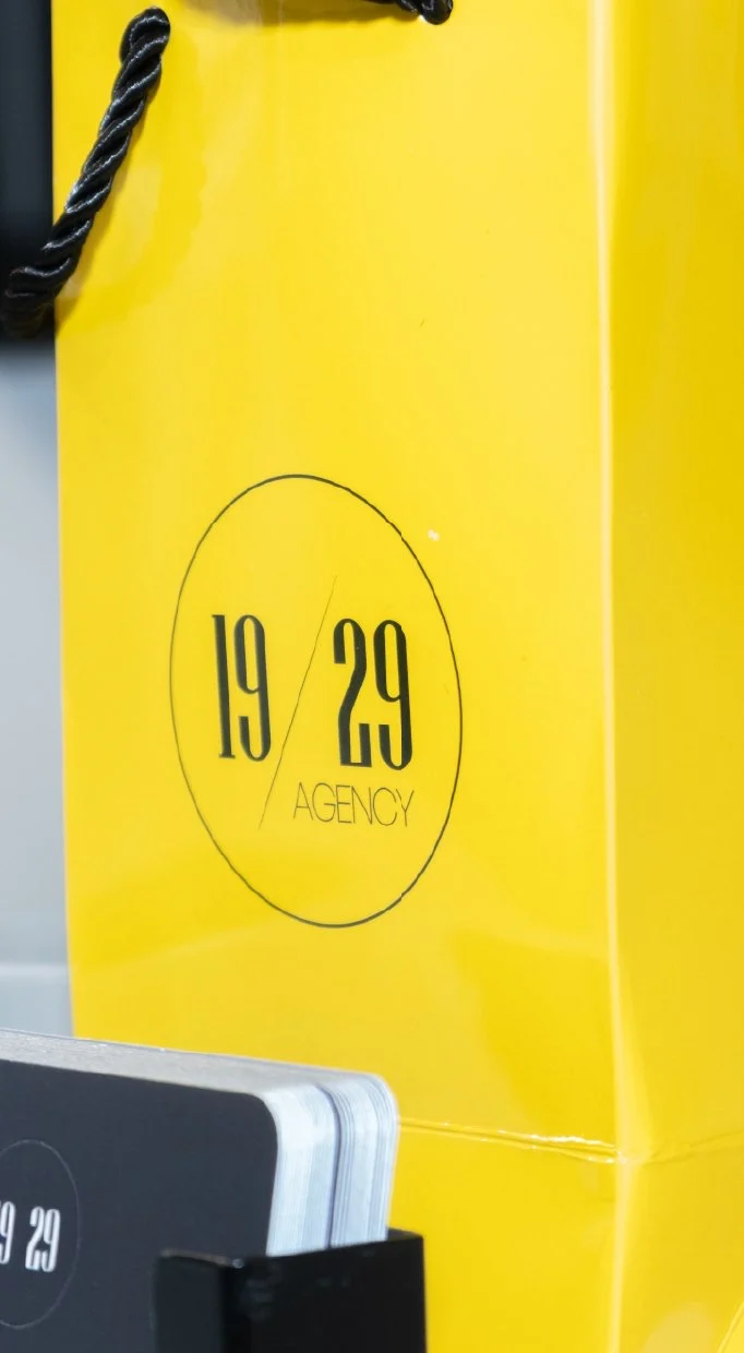 Yellow 19/29 Agency gift bag
