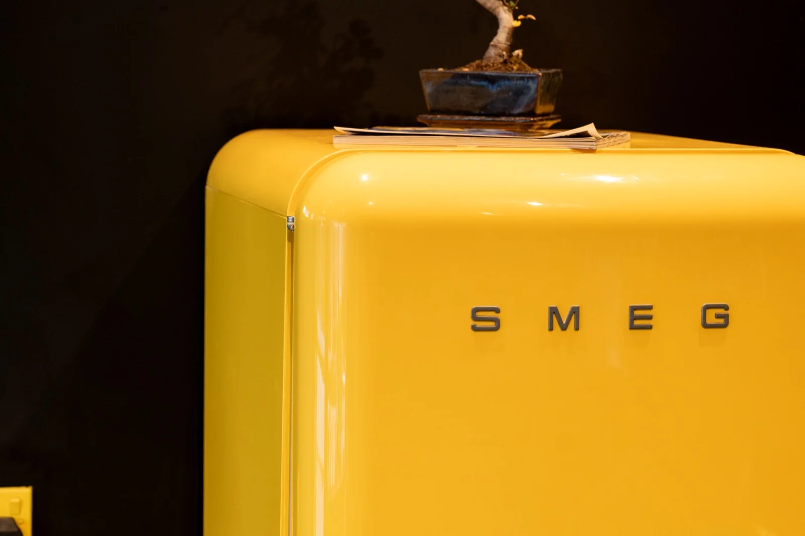 A yellow SMEG fridge at the 19/29 shop